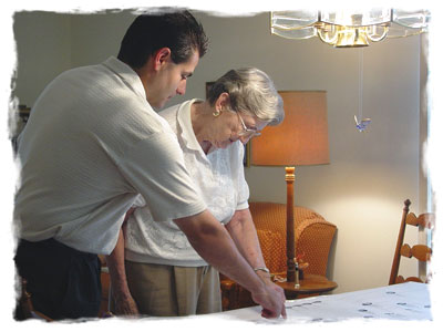 reviewing family history chart with grandma